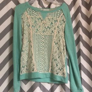 Blue lace, cut-out sweater.